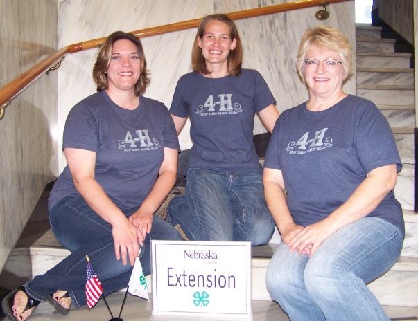 UNL Extension Office in Clay County Wearing 4-H t-shirts during National 4-H Week.